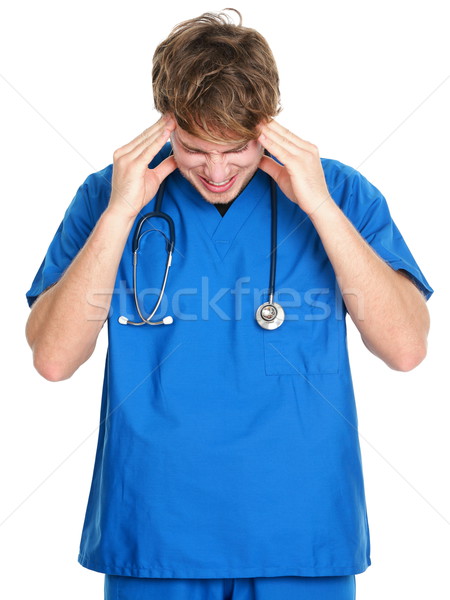 Asistentă medic durere de cap stres tineri Imagine de stoc © Maridav