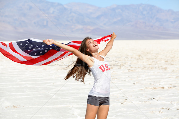 USA flag - woman athlete showing american flag Stock photo © Maridav