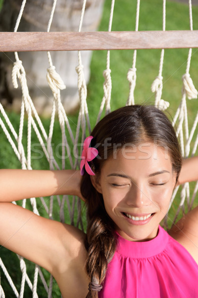 Smiling Woman Lying On Hammock In Park Stock photo © Maridav