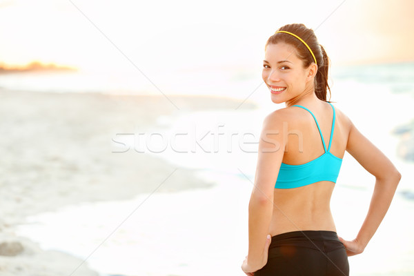 Fitness girl on beach Stock photo © Maridav