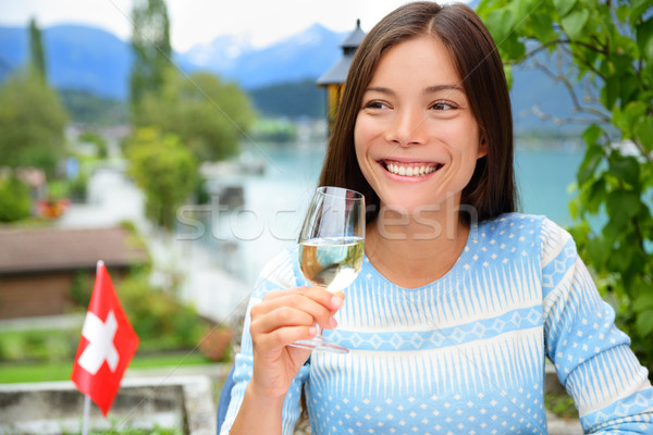 Woman drinking wine at dinner in Switzerland Stock photo © Maridav