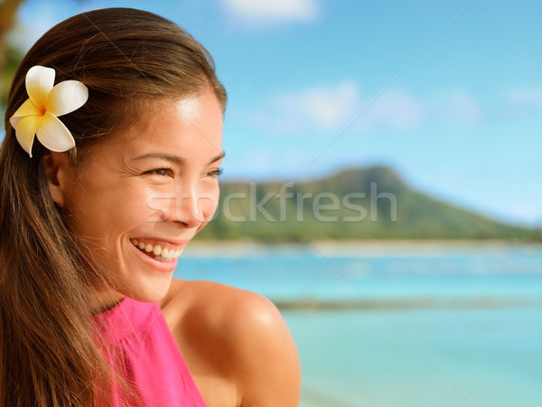 Happy Woman With Frangipani Flower In Hair  Stock photo © Maridav