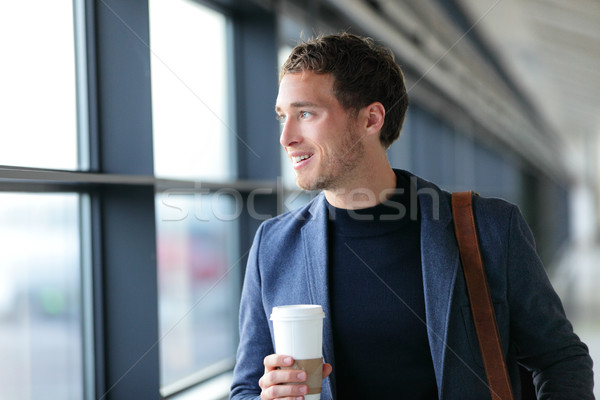 Happy businessman going to work drinking coffee Stock photo © Maridav