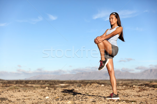 Standing Glutes leg stretch fitness woman workout Stock photo © Maridav