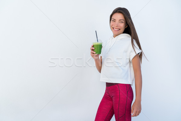 Woman drinking vegetable Green detox smoothie Stock photo © Maridav