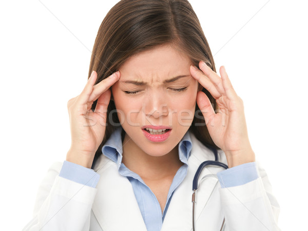 Medic durere de cap asistentă migrena suprasolicitat Imagine de stoc © Maridav