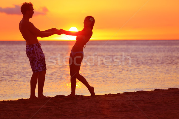 Romantic couple fun on beach sunset during travel Stock photo © Maridav