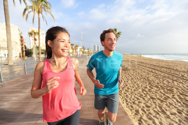 [[stock_photo]]: Courir · homme · femme · Barcelone · plage · couple