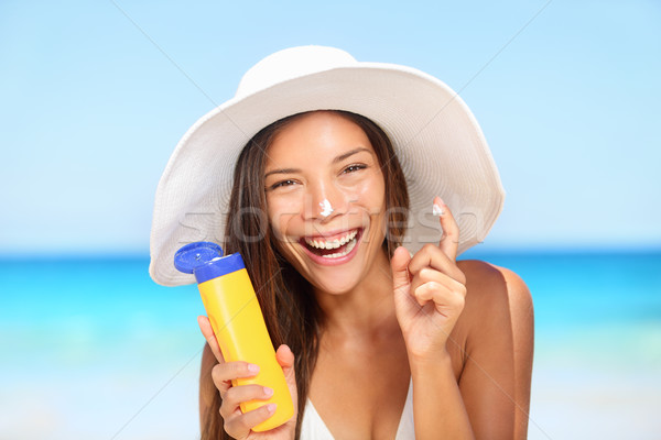 Сток-фото: Солнцезащитный · крем · женщину · загар · лосьон