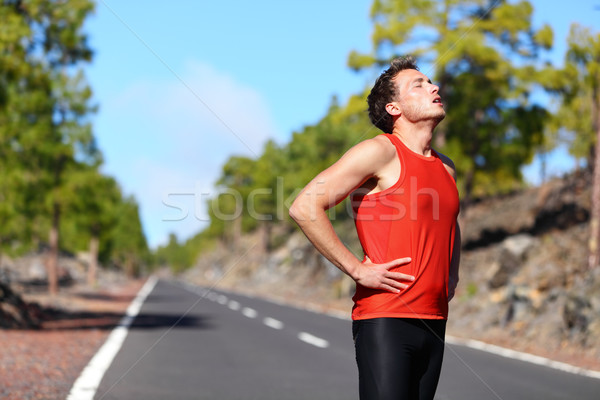 Alergător odihna obosit epuizat funcţionare jogging Imagine de stoc © Maridav