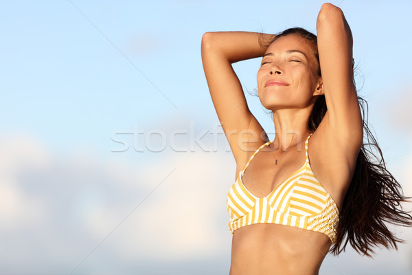 Relaxing bikini woman feeling free in outdoor nature Stock photo © Maridav