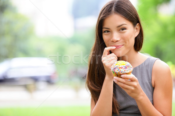 Cupcake - woman eating cupcakes in New York Stock photo © Maridav