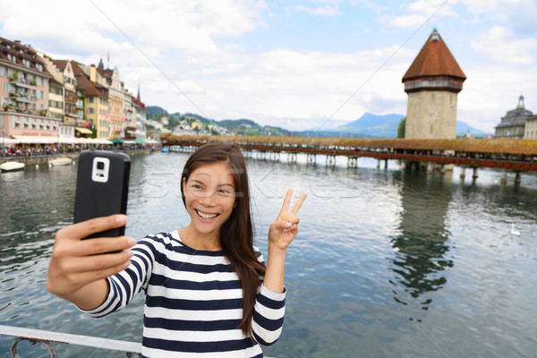 Tourist selfie woman in Lucerne Switzerland Stock photo © Maridav