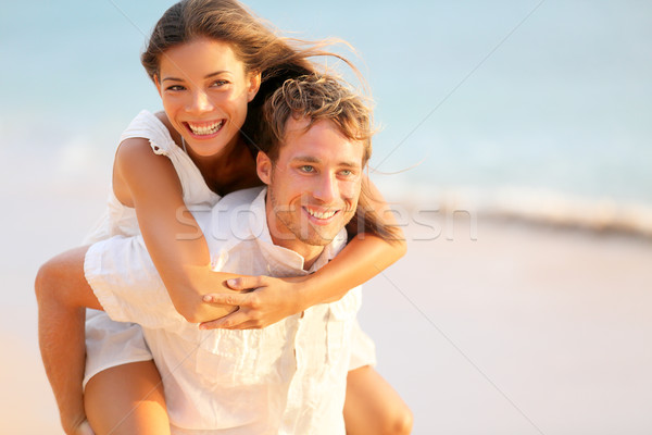 Lovers couple in love having fun on beach portrait Stock photo © Maridav