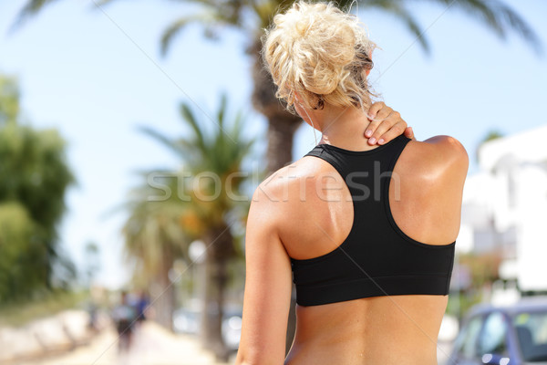 Ból szyi sportu runner kobieta powrót szkoda Zdjęcia stock © Maridav