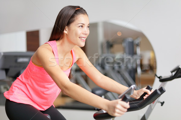Testmozgás bicikli fitnessz nő kerék fitt női Stock fotó © Maridav