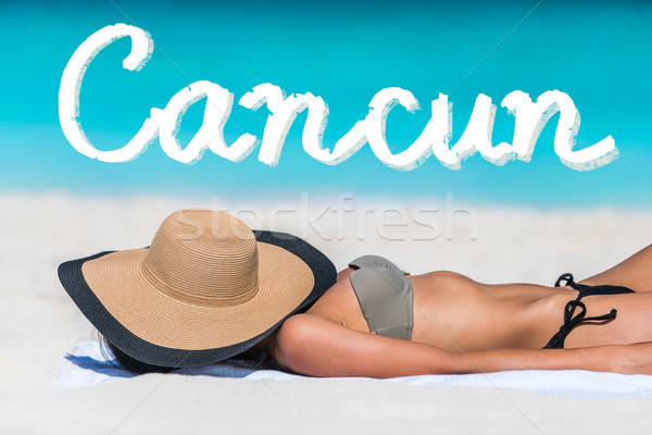 Cancun tengerpart vakáció bikini lesülés nő Stock fotó © Maridav