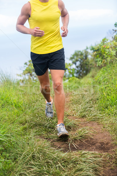 Fitness runner jogging in running shoes outdoors Stock photo © Maridav