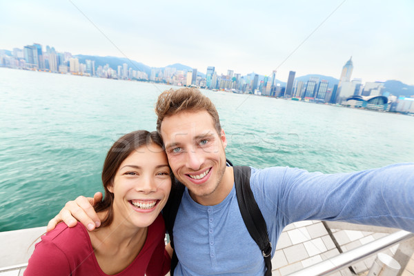 Selfie - Tourists couple taking picture Hong Kong Stock photo © Maridav