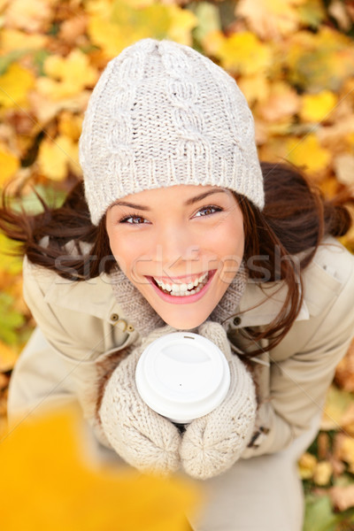 Autumn woman drinking coffee in fall forest Stock photo © Maridav