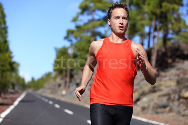 Sprinting runner man running fast Stock photo © Maridav