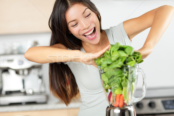 Vegetable smoothie woman making green smoothies Stock photo © Maridav