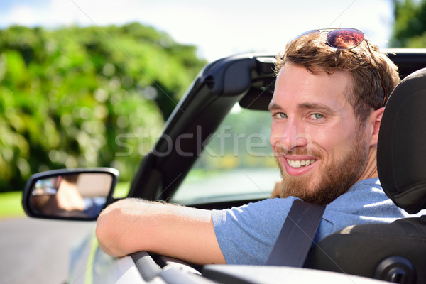 Car driver - young man driving convertible Stock photo © Maridav