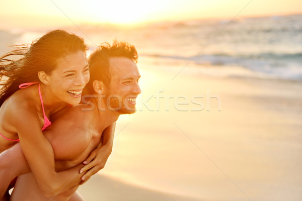 Lovers couple in love having fun on beach portrait Stock photo © Maridav
