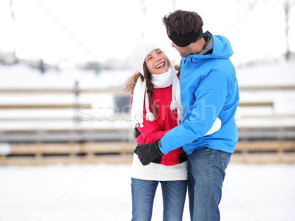 Ice skating romantic couple on date iceskating Stock photo © Maridav