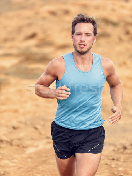 Trail runner training cardio running on mountain Stock photo © Maridav