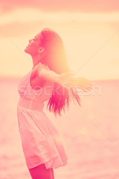 Freedom - Free happy serene woman enjoying sunset Stock photo © Maridav