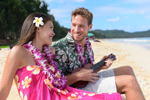 Couple fun on beach playing ukulele on Hawaii Stock photo © Maridav
