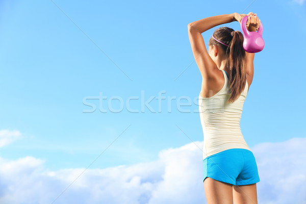 Fitnessz nő kettlebell kívül crossfit erőedzés copy space Stock fotó © Maridav