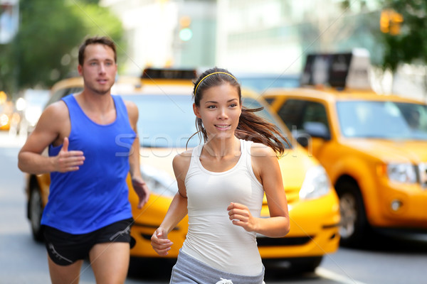 Couple running on fifth avenue, New York NYC Stock photo © Maridav