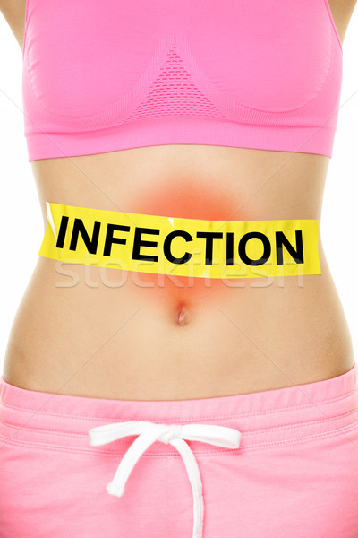 Infection word written on stomach - body problem Stock photo © Maridav