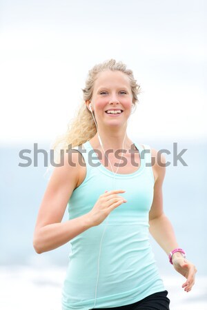 Running woman - runner jogging outdoors Stock photo © Maridav