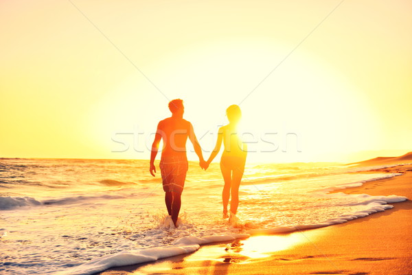 Summer beach couple romantic holding hands sunset Stock photo © Maridav