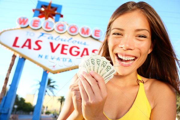 Las Vegas lány izgatott tart pénz nyertes Stock fotó © Maridav
