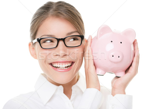 Glasses woman saving on eyewear showing piggy bank Stock photo © Maridav