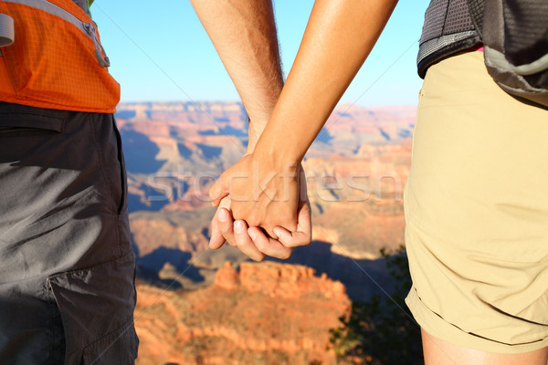 Romantique randonnée couple mains tenant Grand Canyon [[stock_photo]] © Maridav