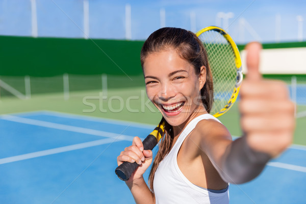 Happy Asian tennis player girl thumbs up game fun Stock photo © Maridav