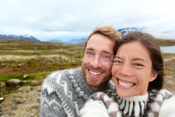 Iceland couple selfie wearing Icelandic sweaters Stock photo © Maridav