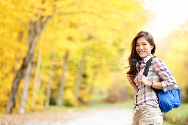 Stock photo: Fall hiking girl in autumn forest