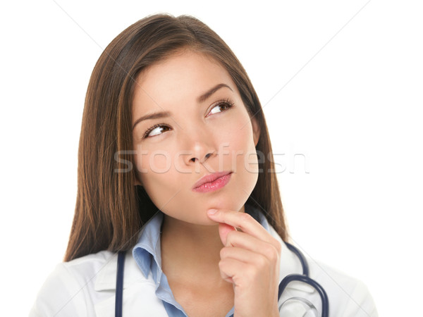 Thinking medical doctor woman Stock photo © Maridav