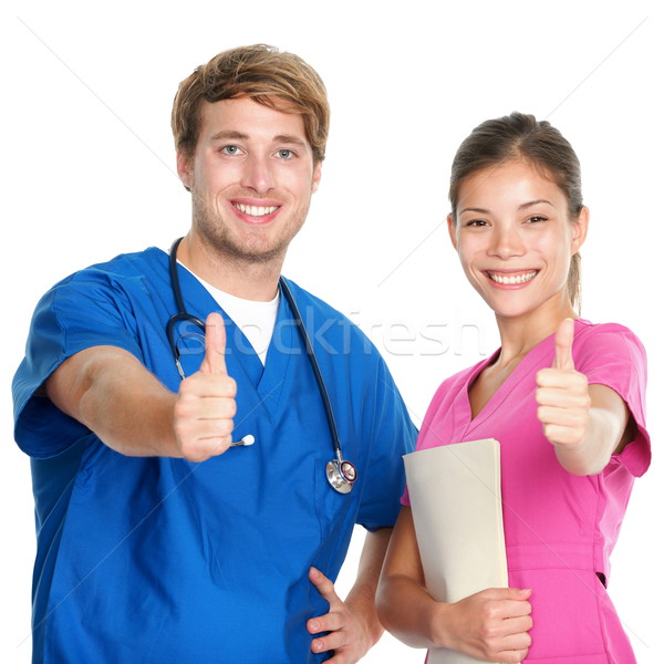Asistentă medic echipă fericit zâmbitor Imagine de stoc © Maridav