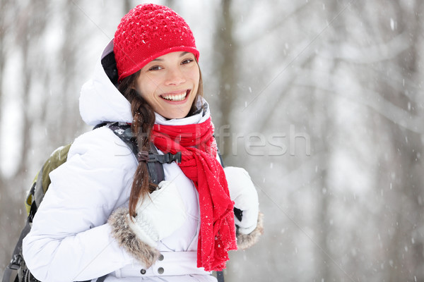 Woman winter hiking in snow Stock photo © Maridav