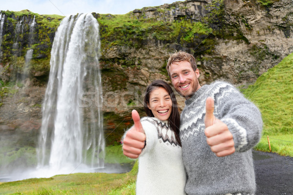 Iceland couple thumbs up wearing Icelandic sweater  Stock photo © Maridav