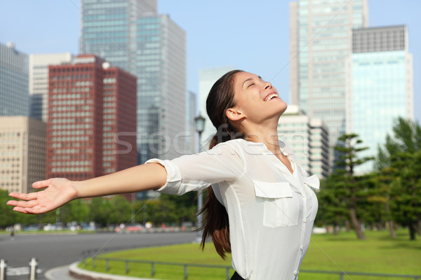 Happy free japanese business woman in Tokyo, Japan Stock photo © Maridav