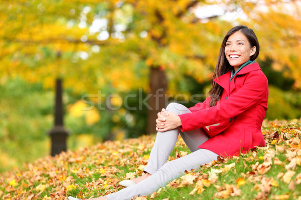 Fall woman relaxing happy in autumn forest foliage Stock photo © Maridav
