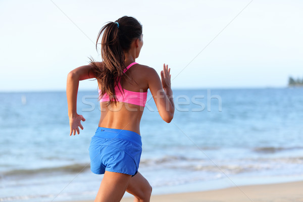 Rückansicht bestimmt Frau Joggen Strand passen Stock foto © Maridav